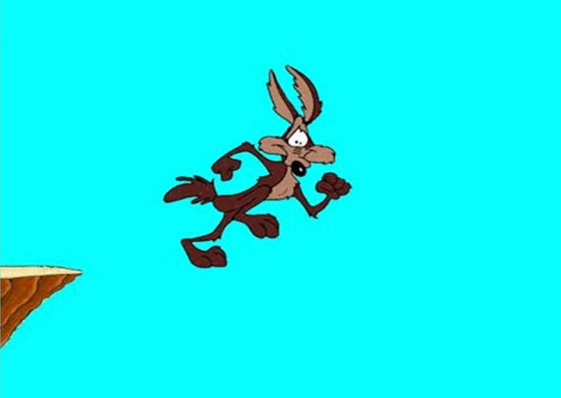 Wile E Coyote realizing he has just run off a cliff